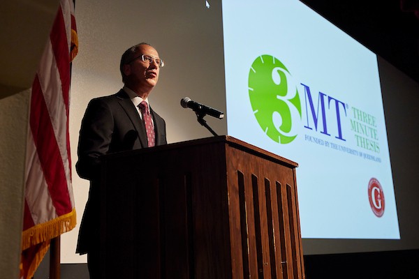 Randall Hewes, Dean of the Graduate College speaking at the 3MT competition.