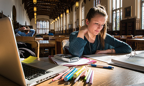 student studying great reading room bizzell library