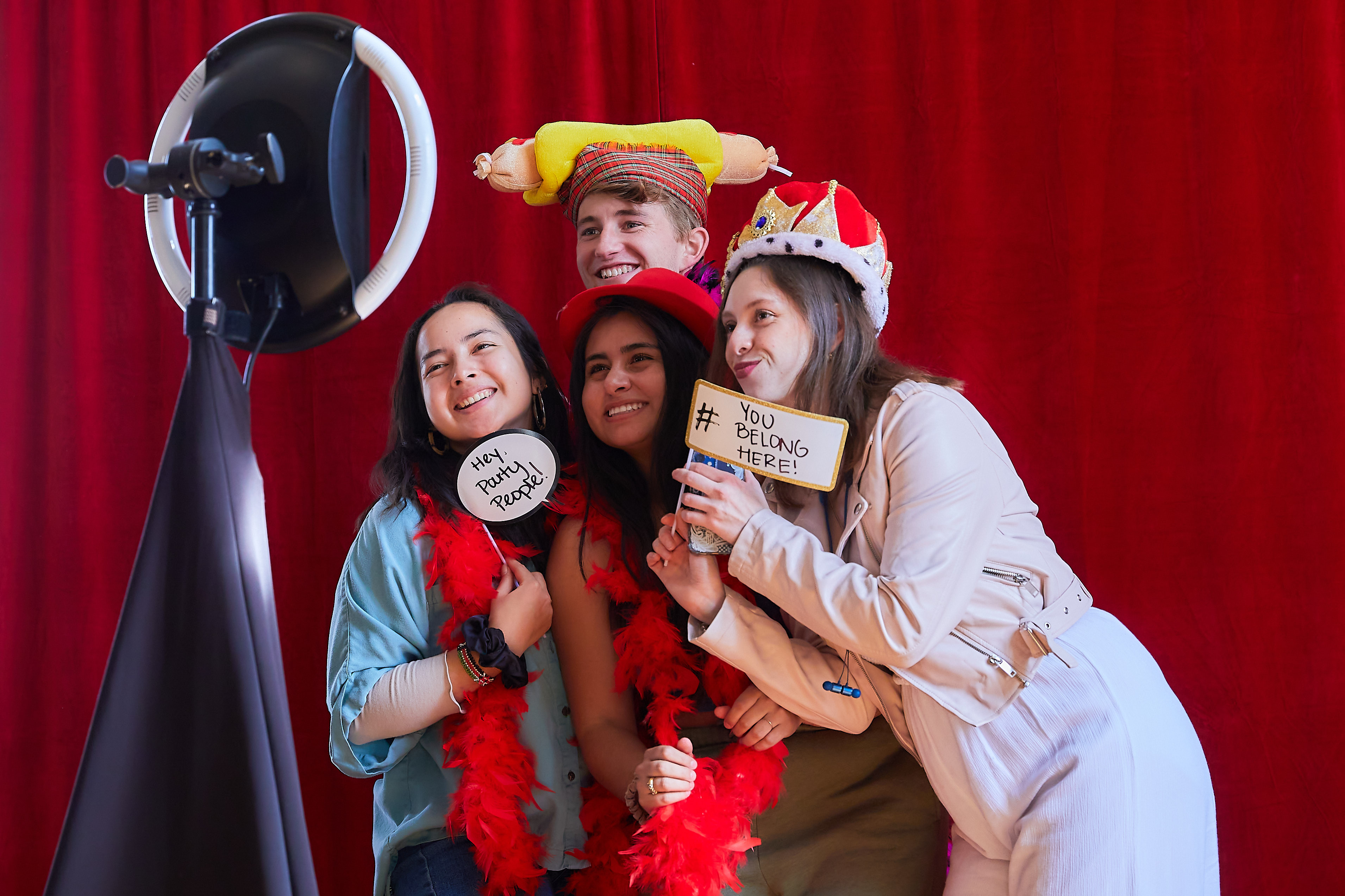 Students using a photo booth at Latino Flavor.