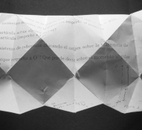 A crumpled piece of paper with writing