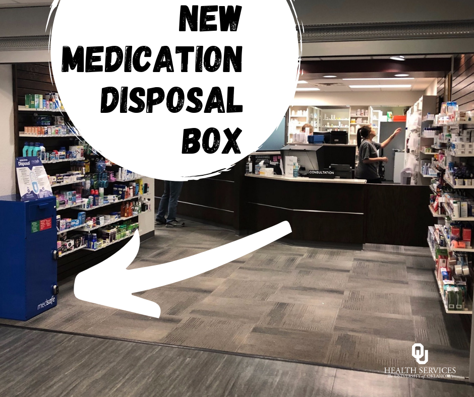 picture of goddard health center pharmacy with arrow pointing to the medication disposal box