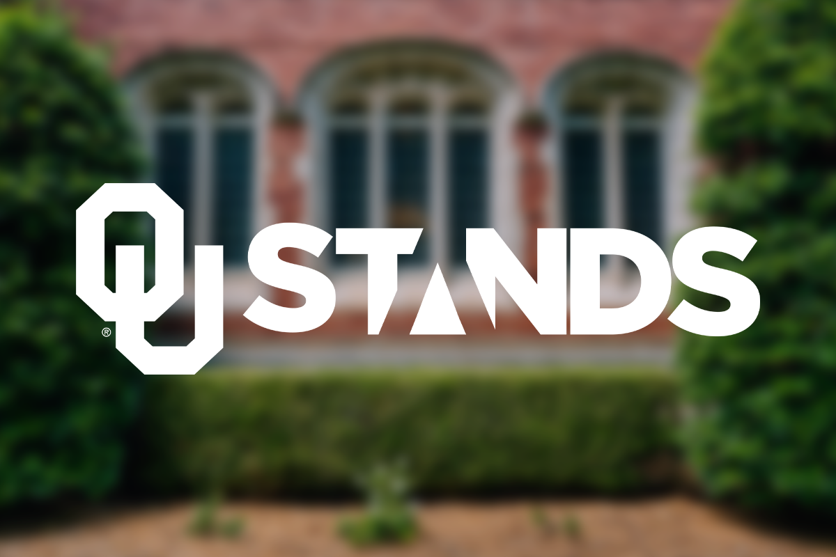 OU Stands logo in white over a blurred photo
