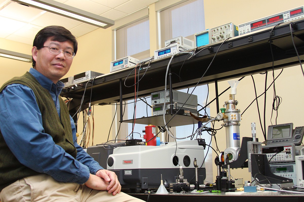 Professor Yang poses in his lab