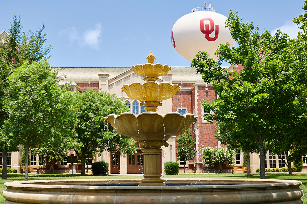 a fountain on OU campus in the summertime