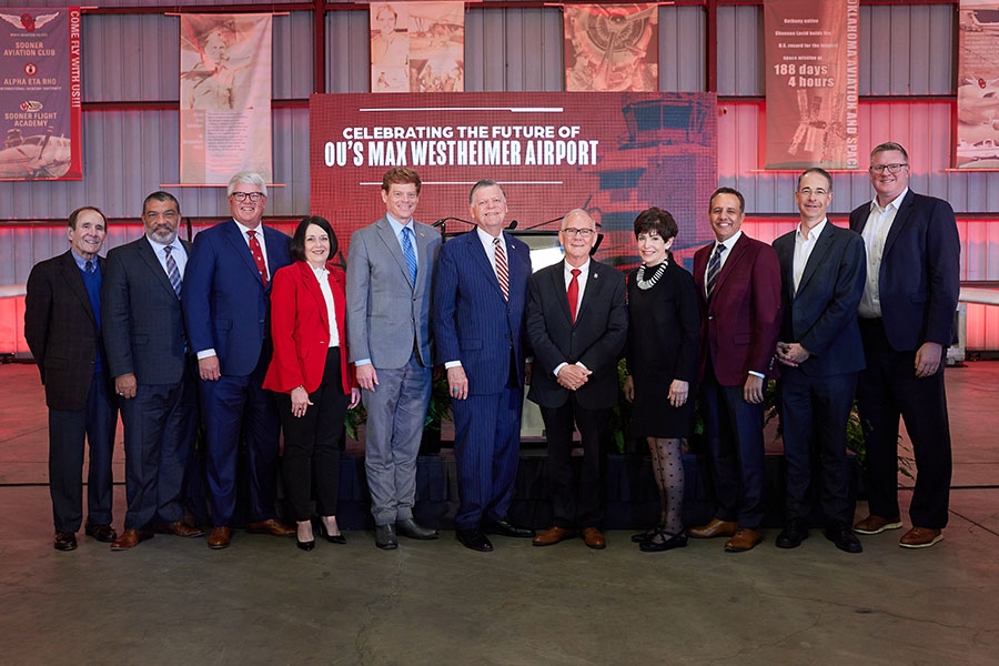OU executives and regents pose during Aviation announcement.