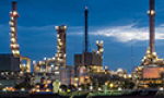 Picture of processing plant at night.