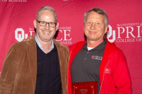 Dean Corey Phelps (left) and Joe Dulin (right) pose for a photo during the awards ceremony