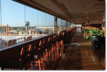 image of counterop with barstools overlooking the OU football stadium