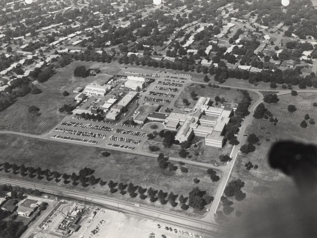 A black and white photo showing the current OU-Tulsa campus from the air