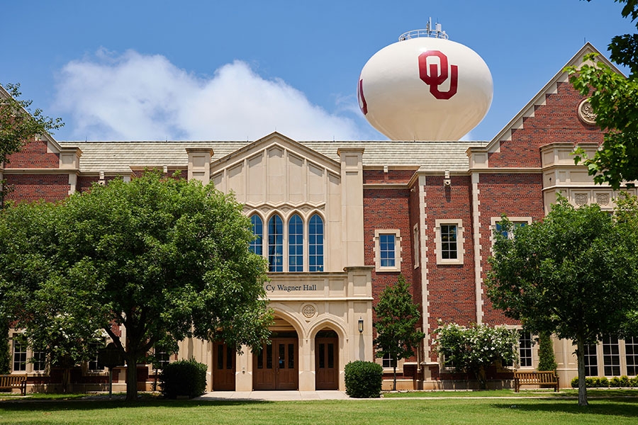 Exterior entrance to Wagner Hall. O U Water tower is in the background.