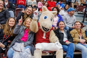 Group photo of students at Sooner Saturday with mascot