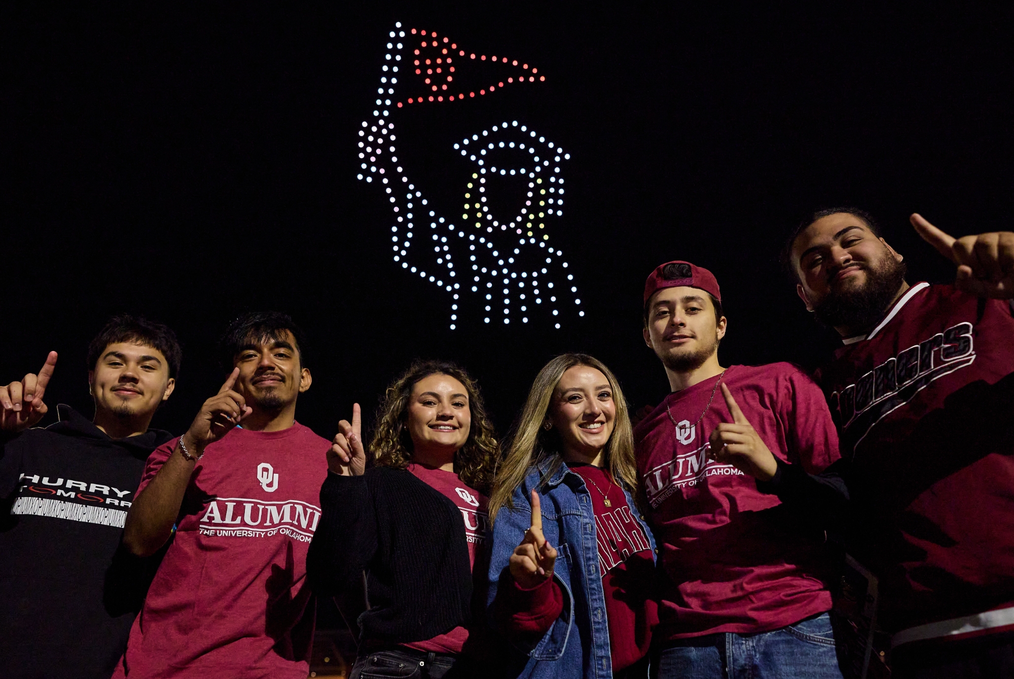 Students watching a drone show 