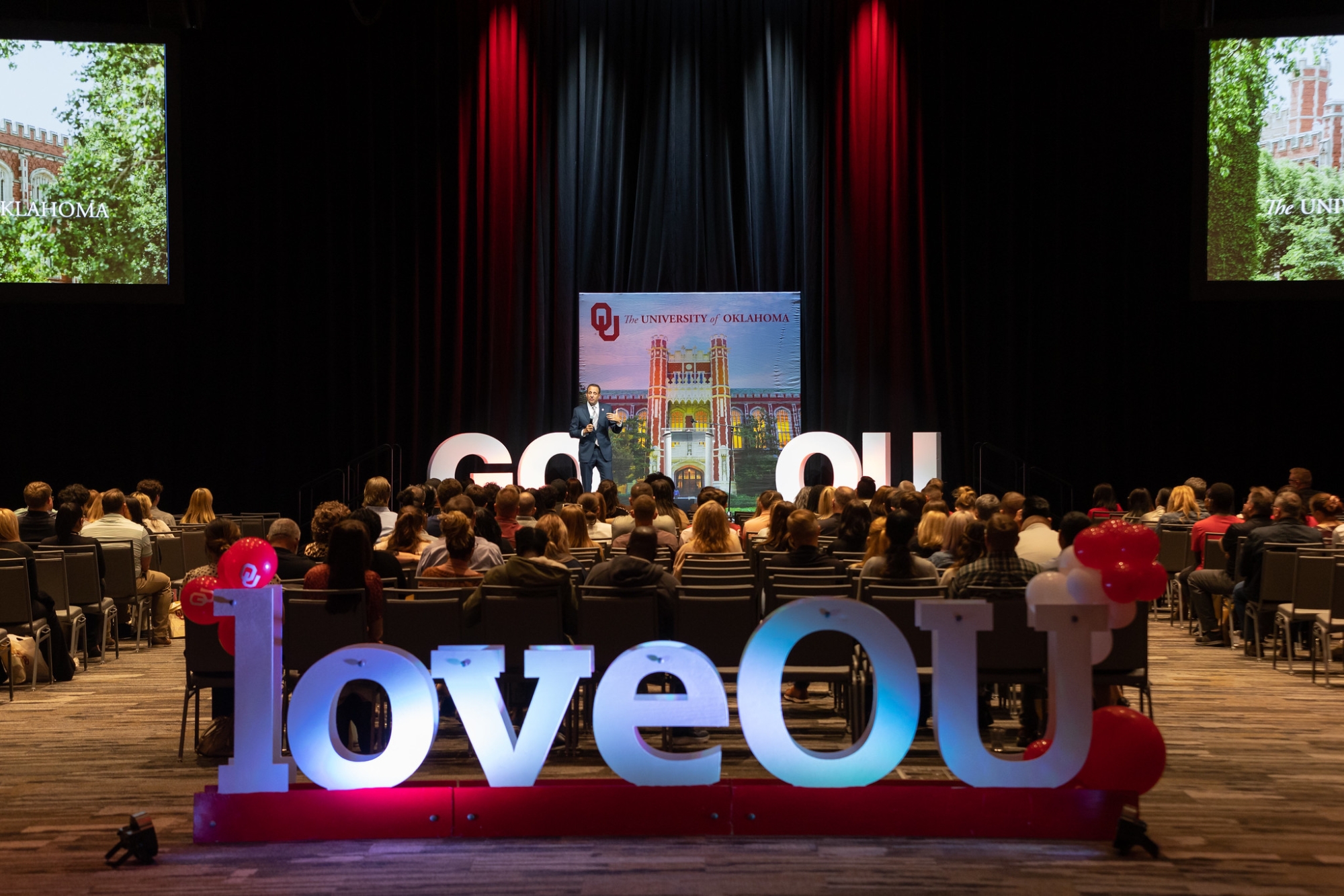 loveOU sign in front of crowd