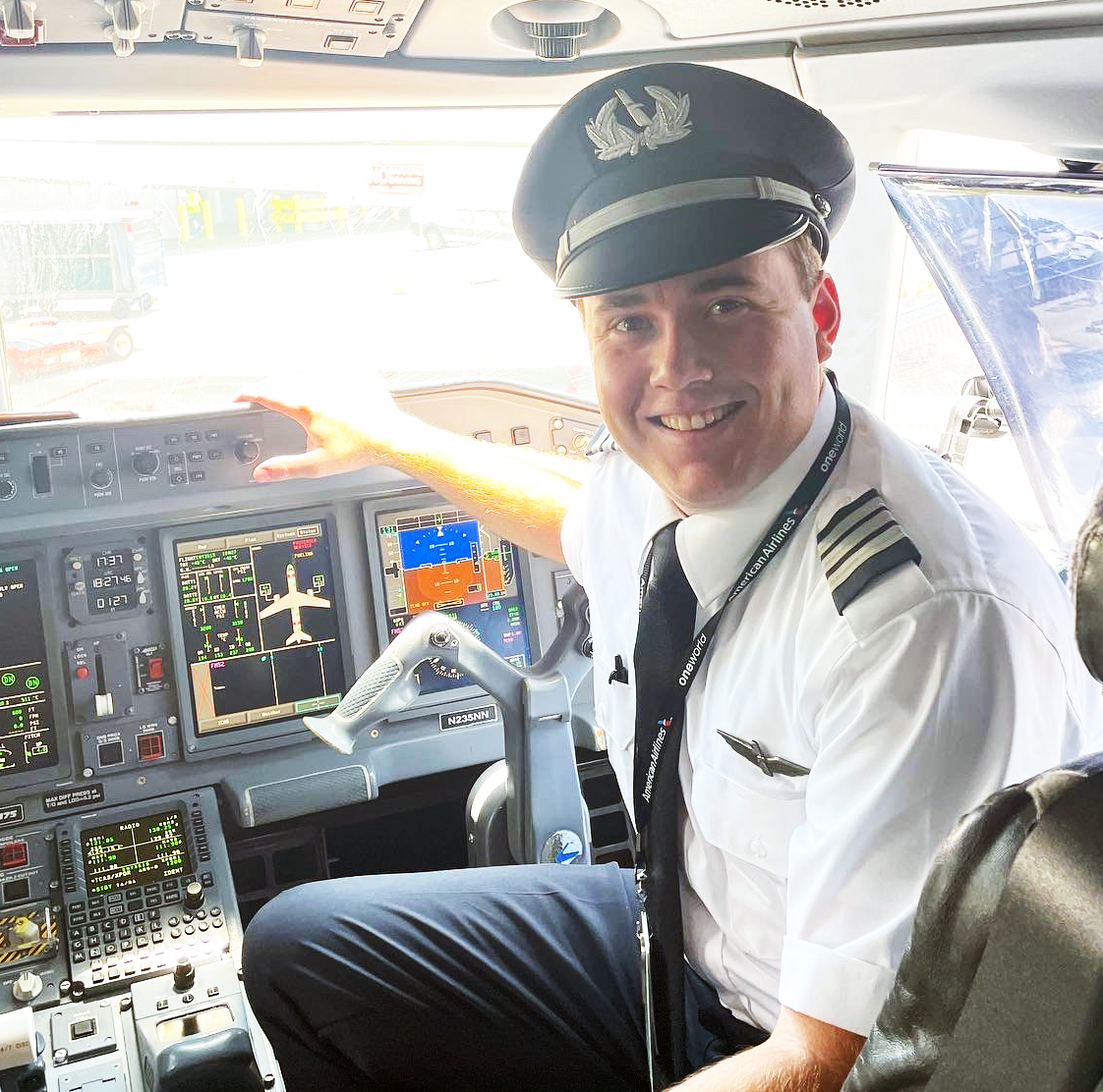 Pilot Matt Gense, School of Aviation Studies Alumnus Sitting in a cockpit of a airplane
