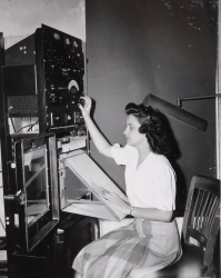 WW1 Woman Meteorologist Working on a radio
