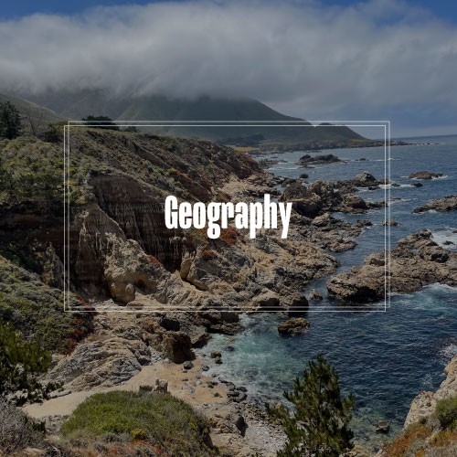 Geography with a landscape of a rocky coastline along the ocean.