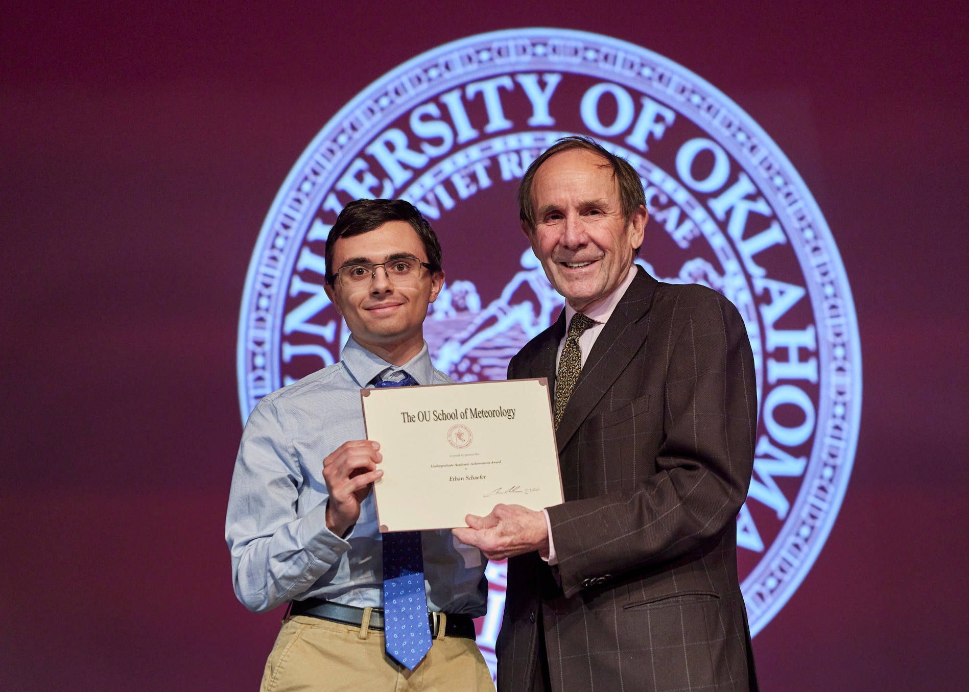 School of Meteorology Undergraduate Academic Achievement Award - Ethan Schaefer with Dean Berrien Moore