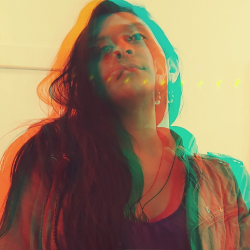 A photo of Aiyesha Ghani with a distorted red and blue filter.