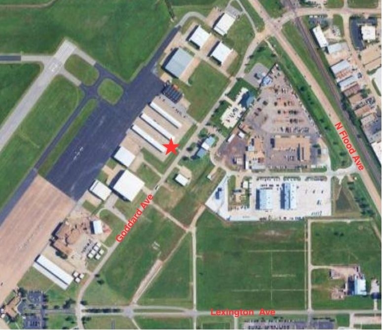 Aerial map of Max Westheimer Airport showing a starred gate for entrance. Lexington Avenue, Goddard Avenue, and North Flood Avenue are labelled. 