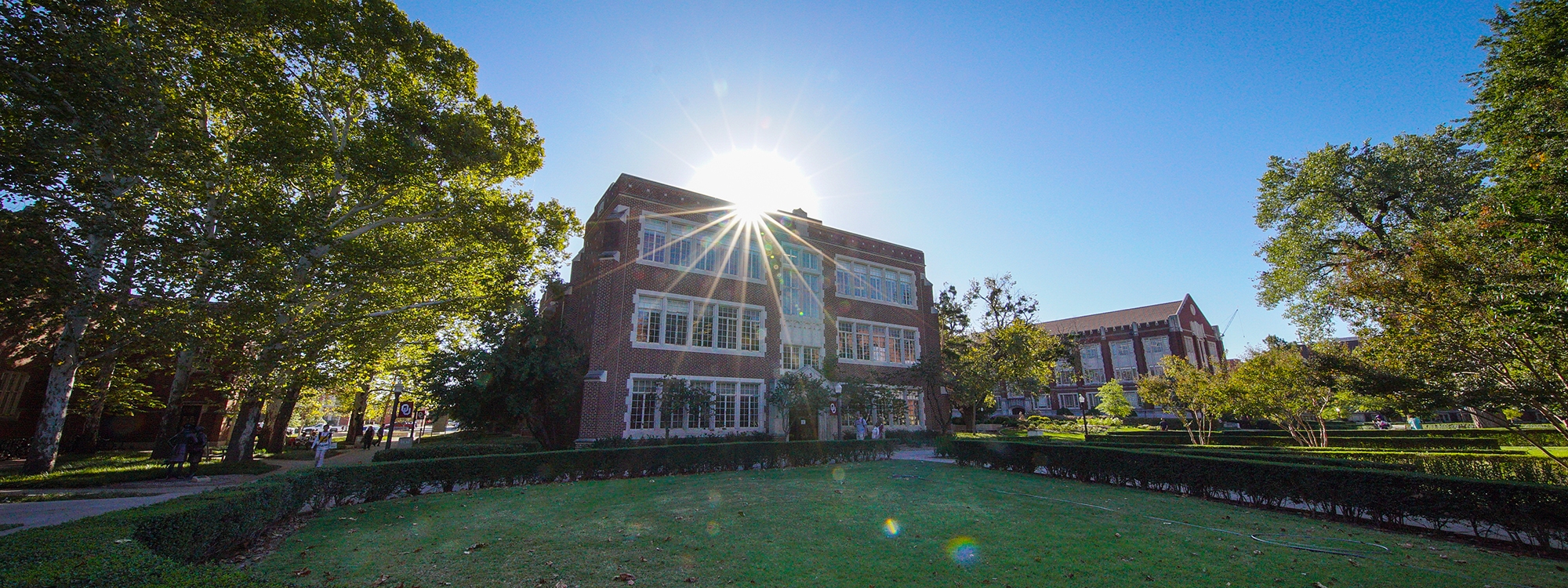 The sun rising over Buchanan Hall on the University of Oklahoma Norman campus.