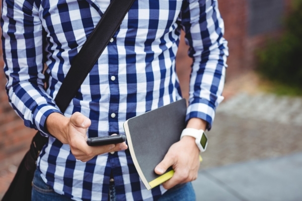 photo of young man on cellphone