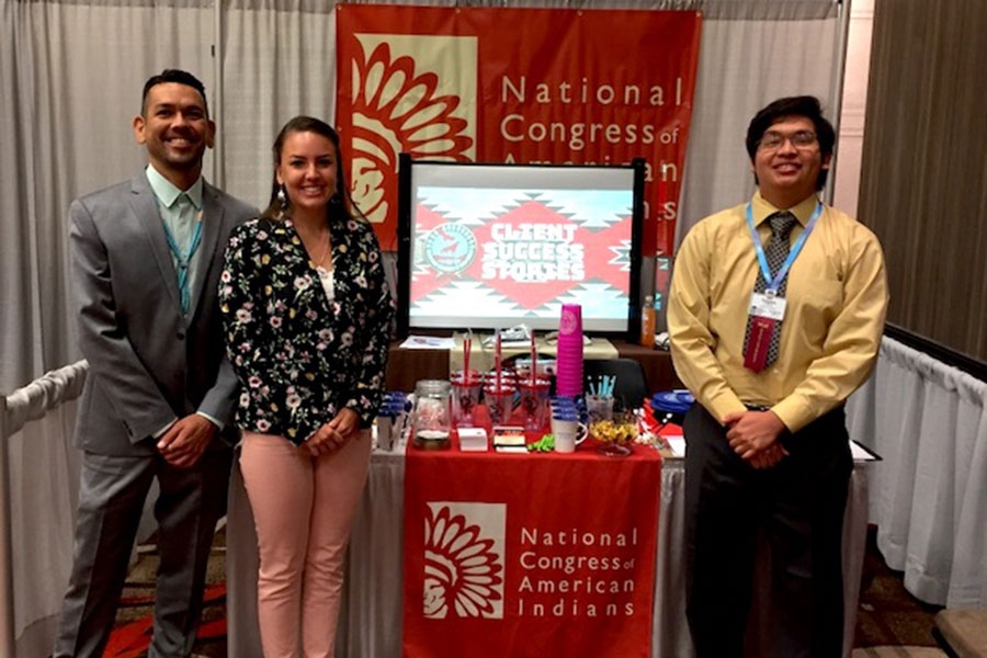 GEN Co-Director Justin Lund stands with scholarship winners Hanna Wensman and Trenton Vu Morris at the NCAI Mid-Year Conference, June 26, 2019. 