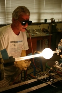 Jim Cornell demonstrating glassblowing technique
