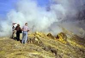 Photo of  INHIGEO excursion participants with fumaroles at crater rim of Vulcano, Aeolian Islands, 1995.