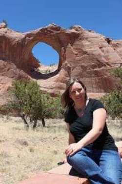 A picture of Kimberly Marshall in front of Window Rock, AZ.