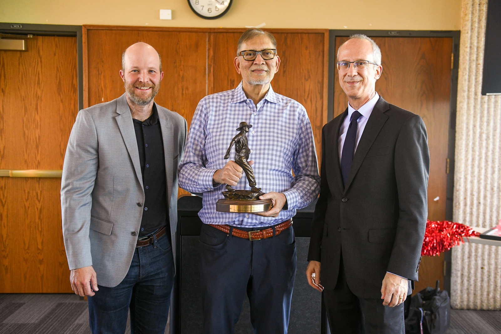 Rusty Jones, Suhas Patwardhan, and Randall Hewes.