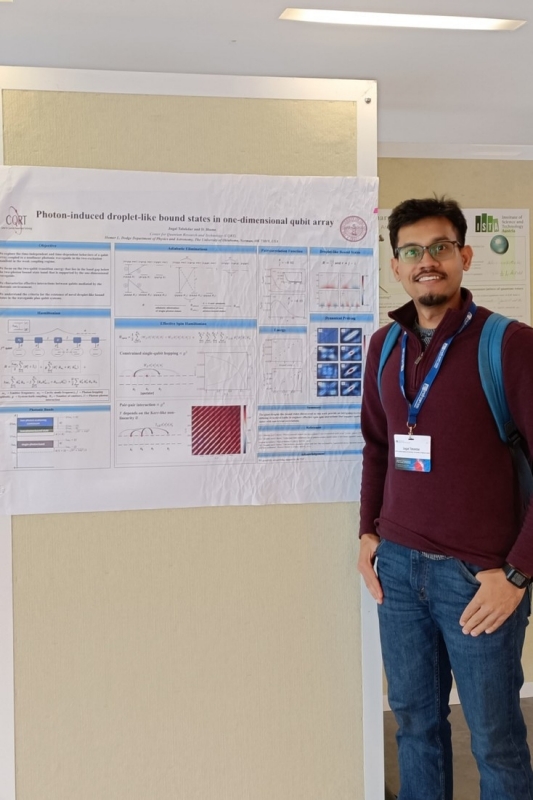 A photo of Jugal Talukdar in front of his poster at the Minerva-Gentner Symposium.