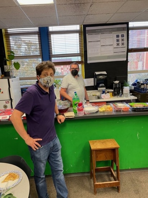 Joe Tischler and Arne Schwettmann attend the SPS party in the physics lounge.