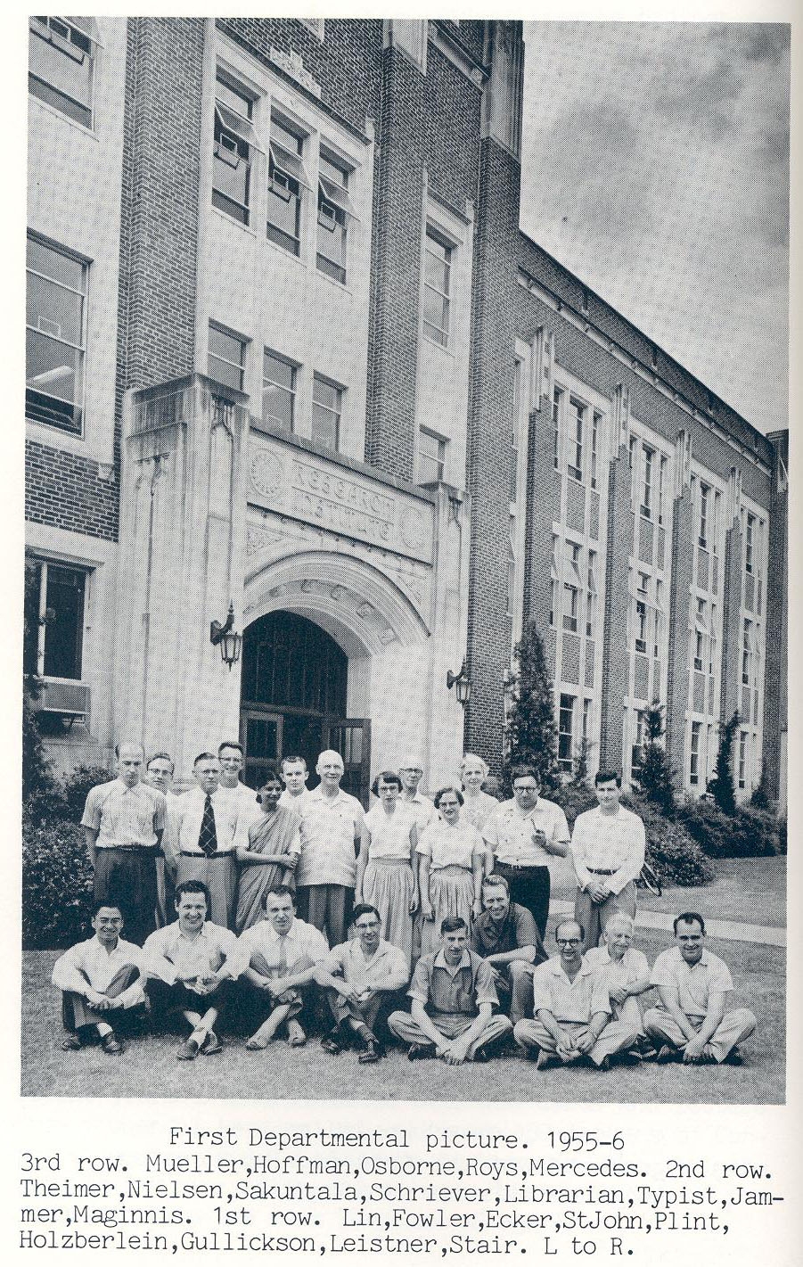 1955-1956 group photo in black and white, scanned in from Fowler book. Text under photo: "[First line] First Departmental picture. 1955-6 [Second line] 3rd row. Mueller, Hoffman, Osborne, Roys, Mercedes. 2nd row. [Third line] Theimer, Nielsen, Sakuntala, Schriever, Librarian, Typist, Jammer, [Fourth line] Marginnis. 1st row. Lin, Fowler, Ecker, StJohn, Plint, [Fifth line] Holzberlein, Gullickson, Leistner, Stair. L to R."