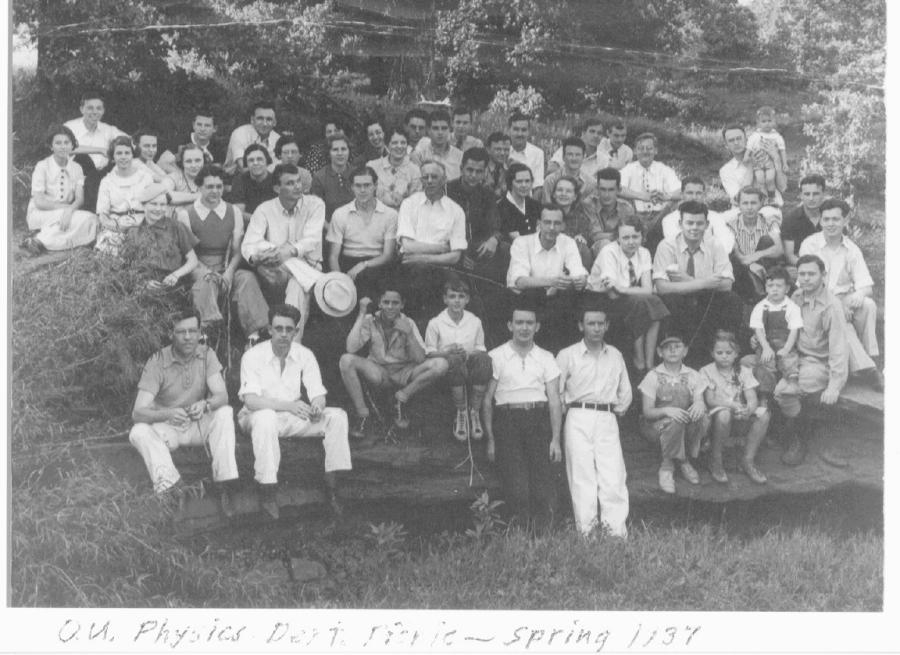 1936-1937 group photo in black and white. Text under photo: "OU Physics Dept Picnic - Spring 1937".