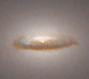 Dust Disk Around a Black Hole in Galaxy NGC 7052 Source: Hubblesite.org