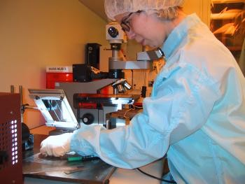 Student performs photolithography in our clean room