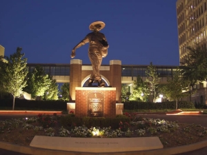 sower statue at night at OUHSC