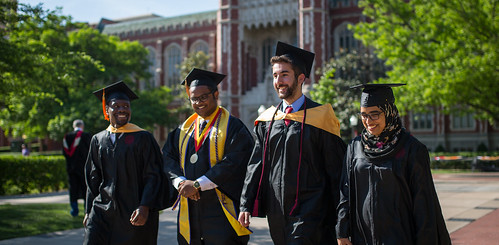Graduating students walking on the south oval