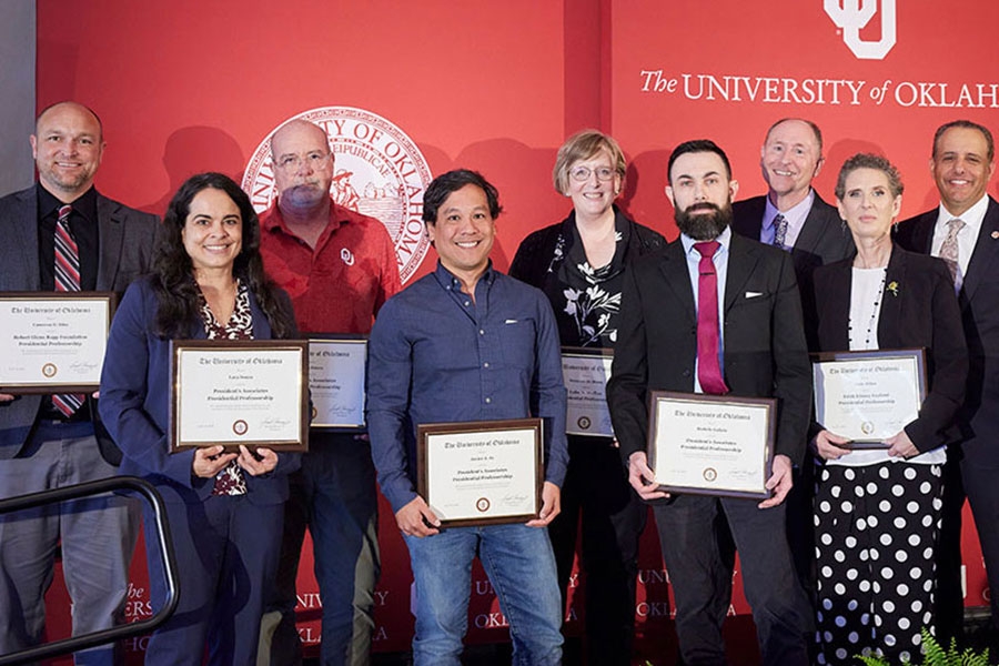 Dr. June Abbas receives a Presidential Professorship with several other faculty members.