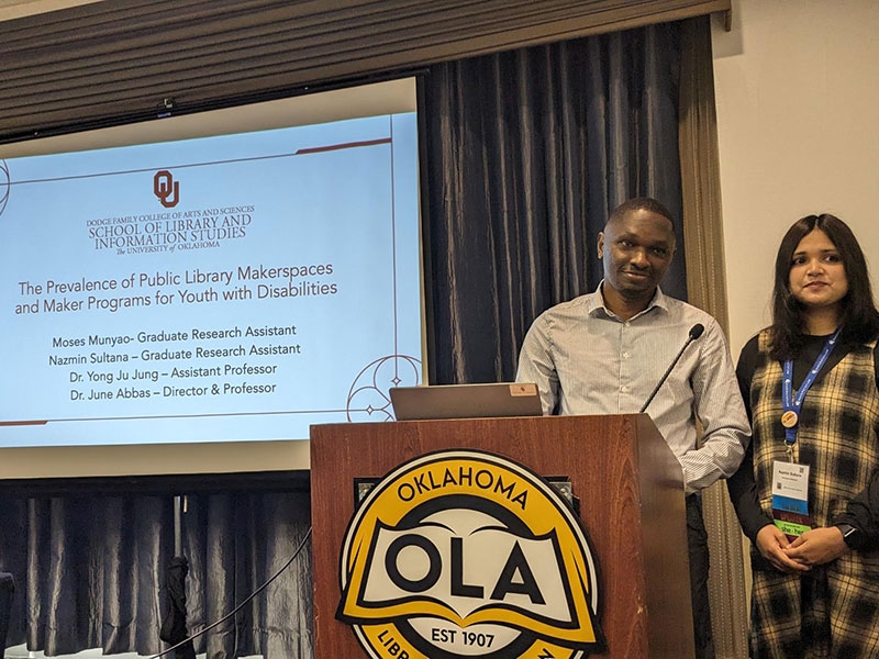 PhD Students Moses Munyao and Nazmin Sultana.