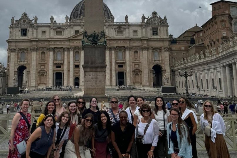 OU student pose in the Vatican City square.