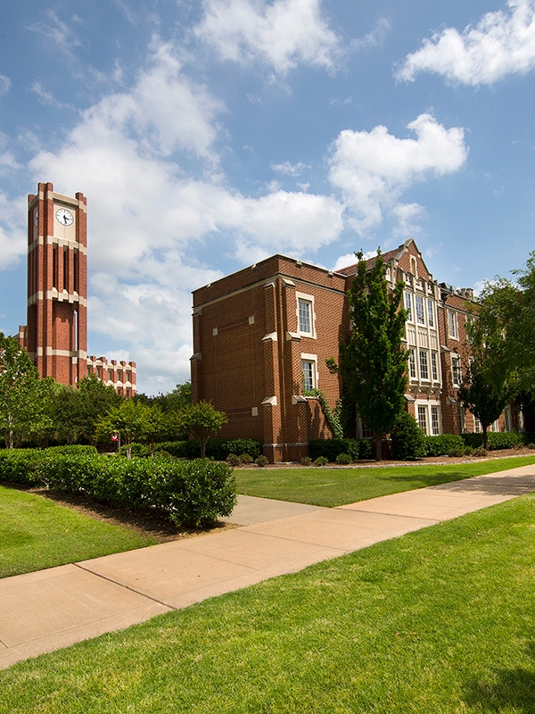 A view of the OU clocktower behind Ellison Hall.