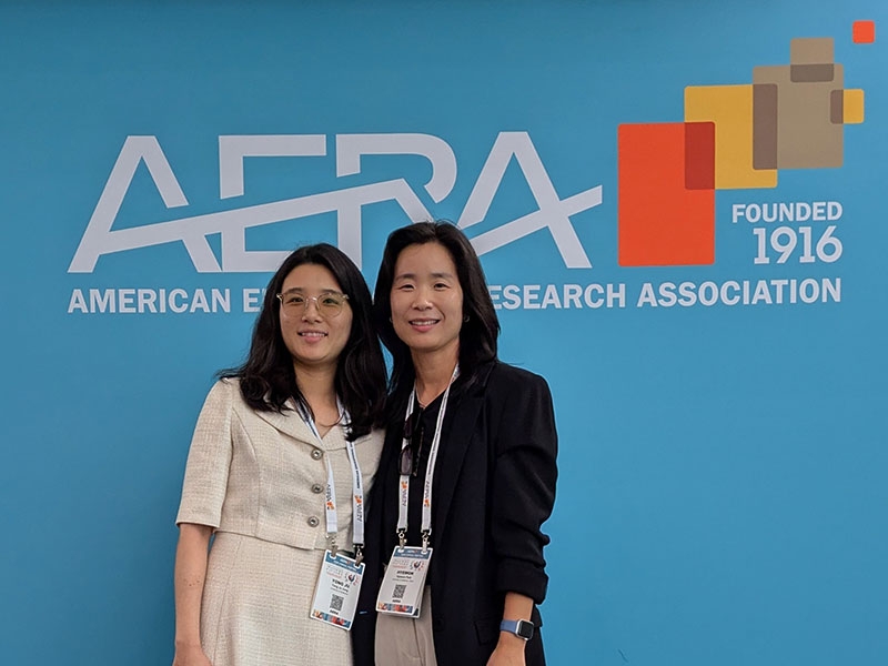 Jung and Park attend AERA conference.
