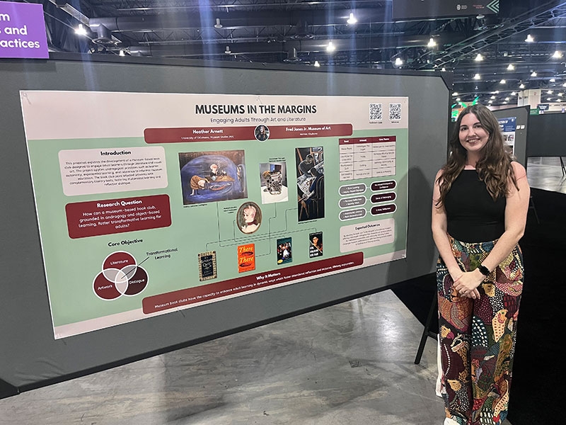 Heather Arnett with presents poster.