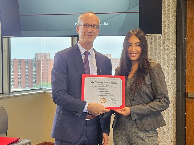 Maddy with Graduate College Dean Hewes.