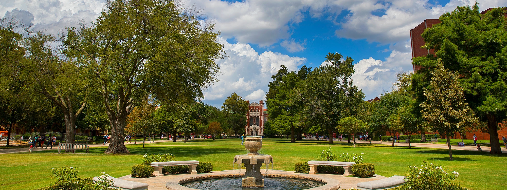 South oval campus fountain surrounded by spring blooms.