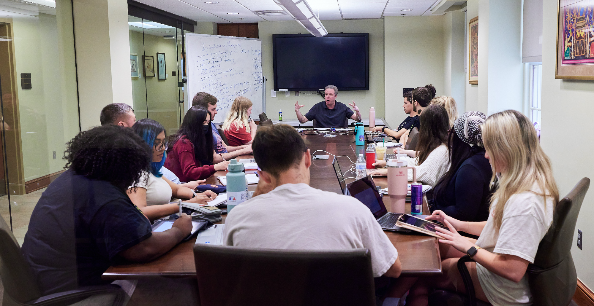 CIS graduate students in class with Professor Mark Raymond, fall 2023