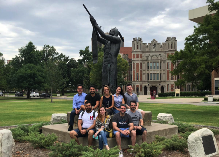 Students posing on the University of Oklahoma campus.
