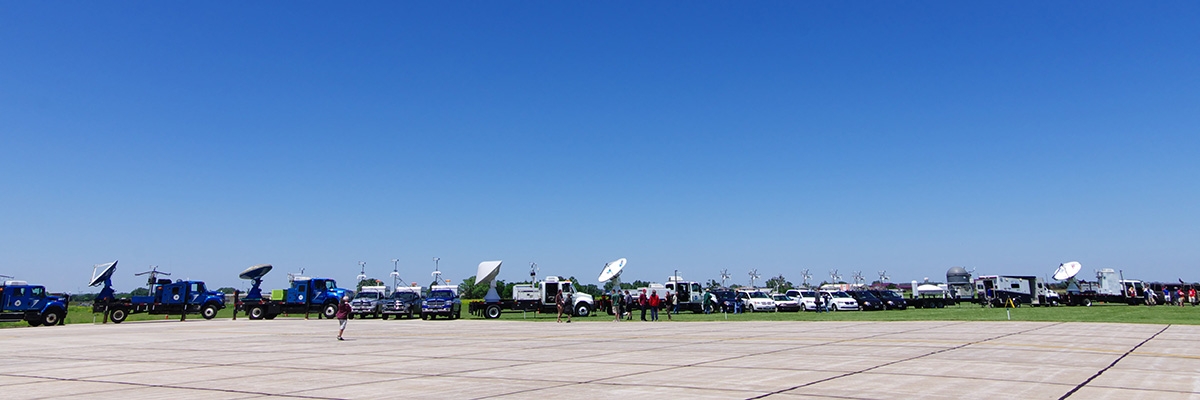 A variety of weather research vehicles including radar trucks.