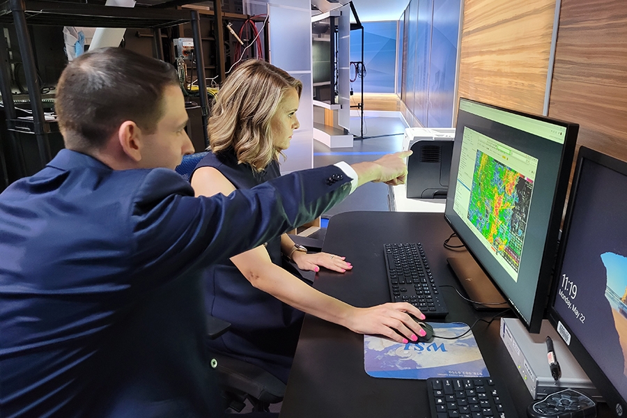 Broadcasters looking at radar data.